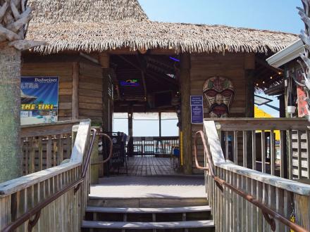 Entrance of Barometer Tiki & Raw Bar, waterfront restaurant in Orange Beach