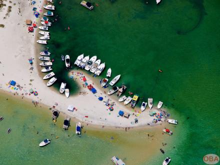 Aerial of boats on Bird Island in Orange Beach