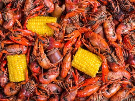Crawfish boil with crawfish, corn on the cob, and sausage