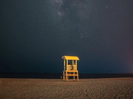 View of the stars shining over the beach in Gulf Shores at night