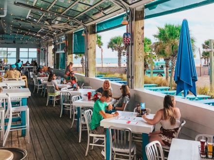 Indoor dining area at The Hangout beachfront restaurant in Gulf Shores