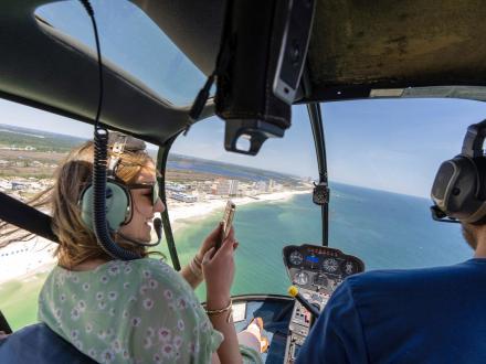 Aerial view of Orange Beach from the cockpit of a helicopter tour
