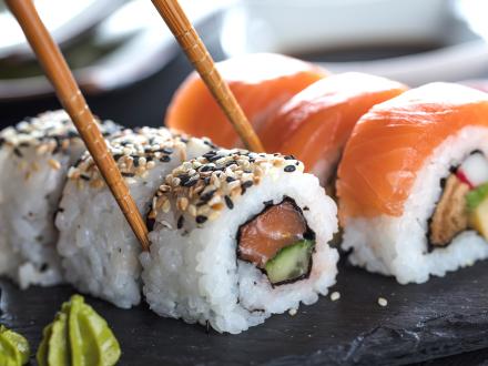 Sushi rolls on a board