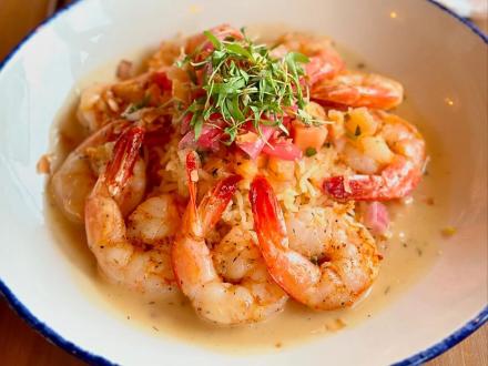 the tropical shrimp dish from Coastal Orange Beach waterfront restaurant