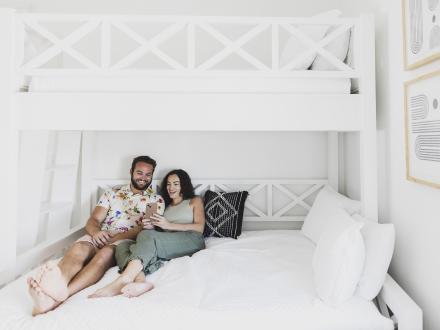 A couple enjoying their spacious vacation rental on Alabama's Beaches