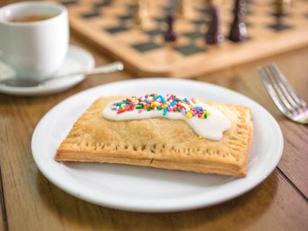 a handmade poptart sitting on a table at BuzzCatz Coffee Shop in Orange Beach