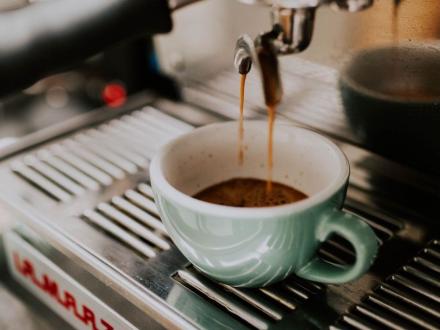 cappuccino machine pouring a fresh cup of coffee at Foam craft coffee shop in Gulf Shores
