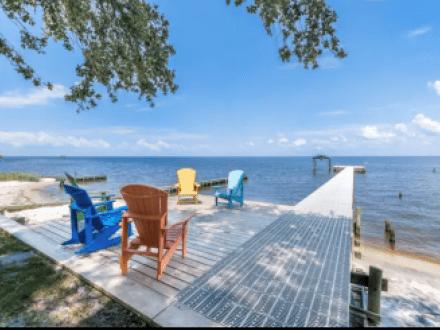 Boardwalk along Mobile Bay at Bay Breeze waterfront RV Park in Gulf Shores