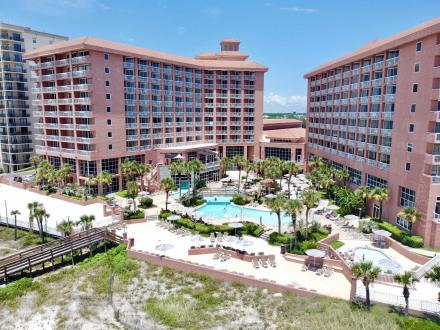Aerial shot of the beachfront pool area at Perdido Beach Resort