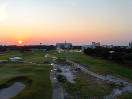 Beautiful sunset over Kiva Dunes award-winning golf course in Gulf Shores