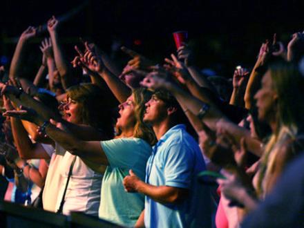Concert goers enjoying music at The Wharf