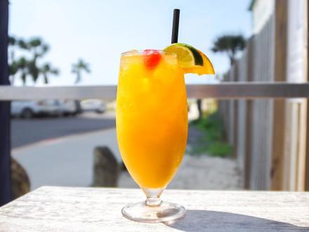 Colorful coastal cocktail at Bahama Bob beachfront restaurant in Gulf Shores