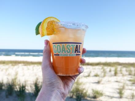 Bright coastal cocktail Orange Beach margarita at Coastal