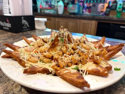 Loaded pita nachos at Wolf Bay restaurant in Orange Beach