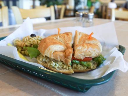 Fresh chicken salad croissant sandwich at Amelia's Deli local restaurant in Gulf Shores