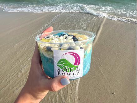 Fresh and colorful acai fruit bowl from Soul Bowlz healthy restaurant in Gulf Shores