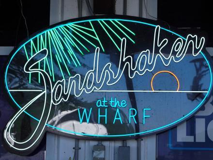 Sandshaker neon sign, waterfront bar at The Wharf
