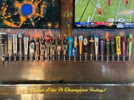 line of beer taps at the bar at Icehouse Tap Room, waterfront bar in Gulf Shores