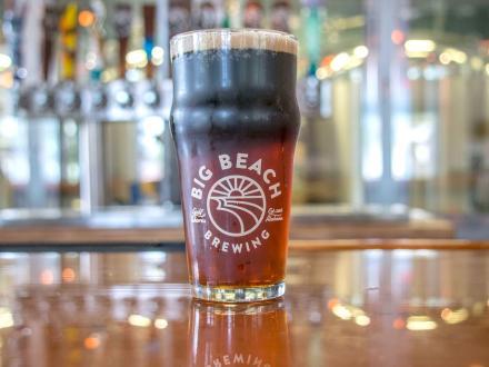 Pint of beer sitting on the bar at Big Beach Brewing, Gulf Shores craft brewery