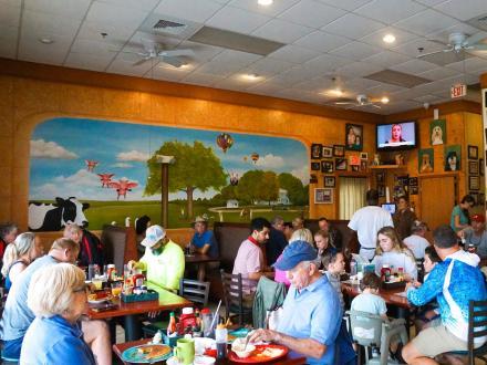 people sitting at tables dining at Kitty's Cafe, local Gulf Shores restaurant