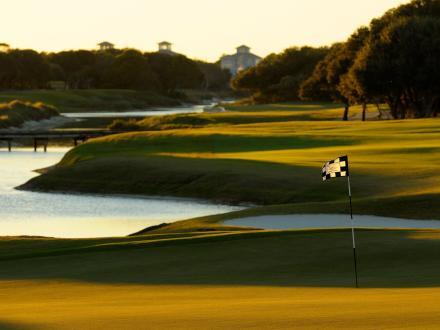 Scenic view of Kiva Dunes golf course at sunset