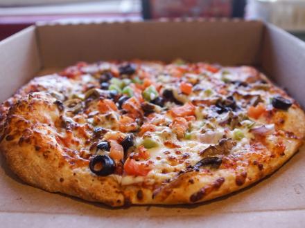 a big, veggie pizza from Papa Rocco's, popular pizza place in Gulf Shores