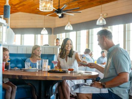 Family dining at Jesse's on the Bay, casual fine dining restaurant in Fort Morgan