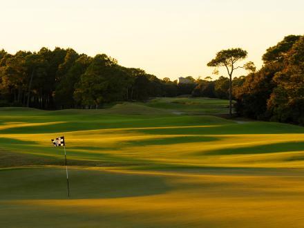 scenic gulf coast golf course at sunset