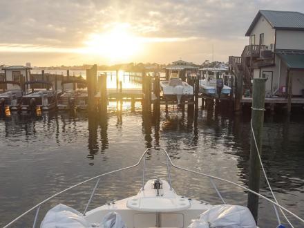 cruise boat docked in Orange Beach during sunset