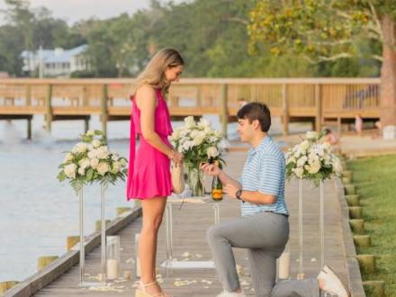 Couple getting engaged at Orange Beach Waterfront Park, photoshoot spot in Orange Beach