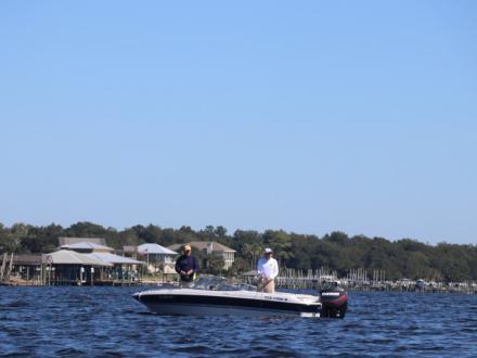 boat cruising through the back bays in Orange Beach