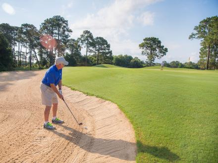 Snowbird golfing at Peninsula Golf & Racquet Club golf course in Fort Morgan