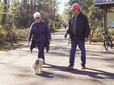 snowbirds dog walking in gulf state park