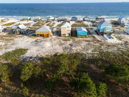 colorful beach houses along the shore in Fort Morgan, Alabama