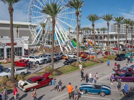 aerial view of crowd and car show at orange beach freedom fest at the wharf