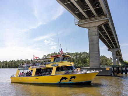 Sunny Lady May Dolphin Cruise coasting the waters in Orange Beach
