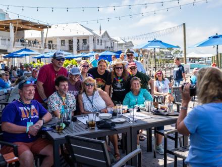 Group of snowbirds dining at Zeke's waterfront restaurant in Orange Beach