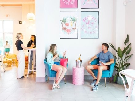 People dining at Gulf Babe Wine Boutique at Portside at The Wharf in Orange Beach