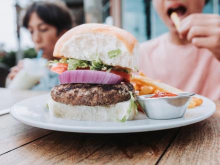 Giant burger at Cobalt waterfront restaurant in Orange Beach