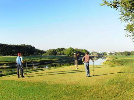 Group of friends golfing at Kiva Dunes Golf Resort in Fort Morgan