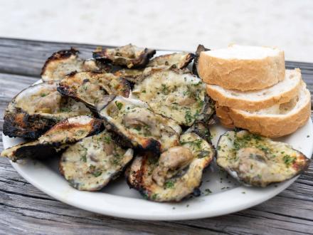 Chargrilled oysters at Flora-Bama bar in Orange Beach