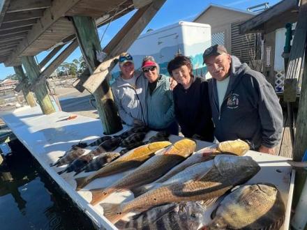 Snowbirds showing off their catches on Alabama's Beaches