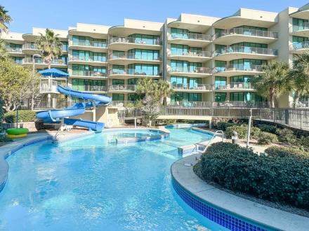 Waterslide and pool at Phoenix on the Bay waterfront resort in Orange Beach