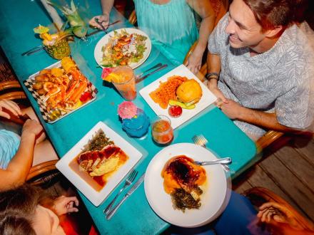 A table filled with food at GTs on the Bay waterfront restaurant