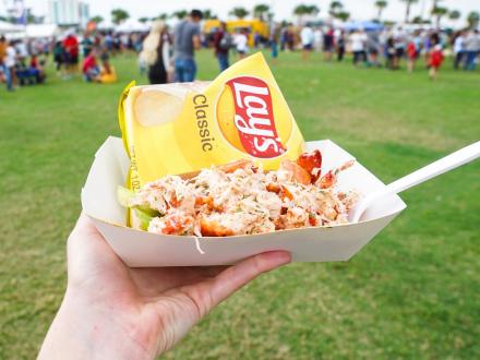 Lobster roll and chips from a vendor at the Coastal Alabama Food Truck Festival in Gulf Shores