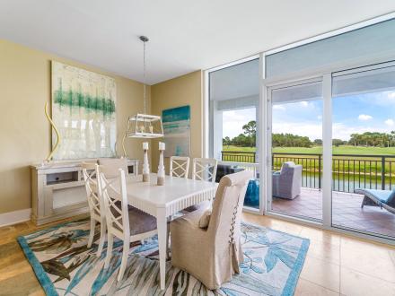 Living room overlooking the golf course at Kiva Dunes Golf Resort in Fort Morgan