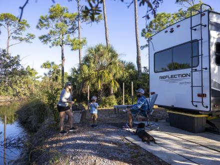 Family camping at Luxury RV Resort campground in Gulf Shores