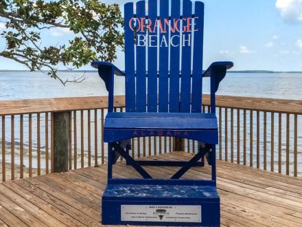 Adirondack chair at the fishing pier at Orange Beach Waterfront Park