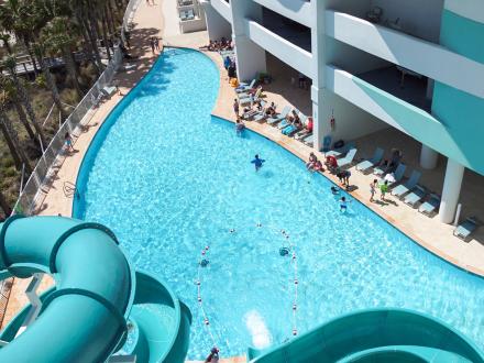 View of pool from the top of the waterslide at Turquoise Place resort in Orange Beach