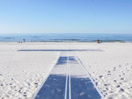 wheelchair accessible beach mat at Cotton Bayou public beach in Orange Beach